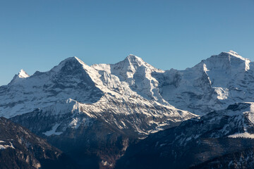 Fototapeta na wymiar view from mountain Niederhorn to mountain peaks Eiger, Moench and Jungfrau in the bernese alps, Switzerland