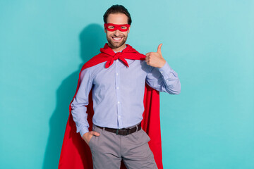 Photo of promoter superhero guy raise thumb up approve solution wear mask purple shirt isolated...