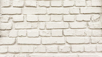 White brick wall texture background. Rough uneven surface.
a brick wall of a milky shade. 
