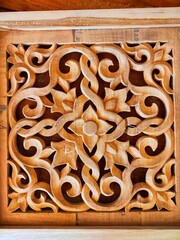 Carving on teak wood with carving motifs typical of Aceh Indonesia