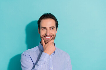 Photo of clever guy finger chin look empty space create best decision wear violet shirt isolated teal color background