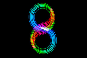 Freezelight photography. Isolated figure on a black background. Number eight.