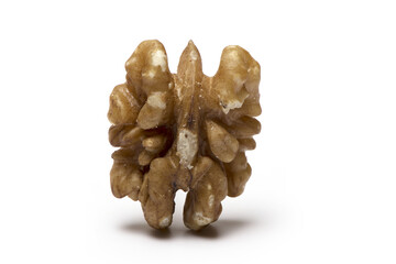 ripe walnut half standing isolated white background