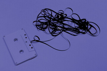 Retro cassette tapes on purple color background