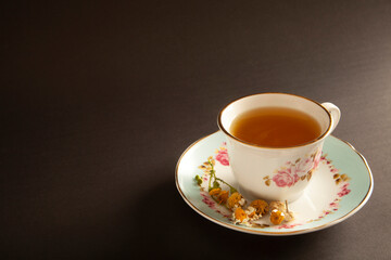 dried daisies and chamomile tea