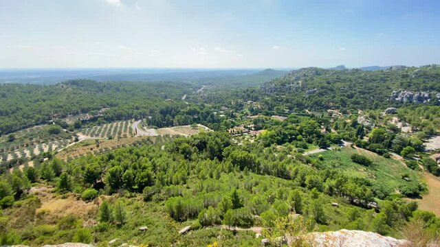 Les Alpilles chain and the Crau plain seen from l'&Eacute;peron des Baux, a belvedere of Les Baux de Provence village in France