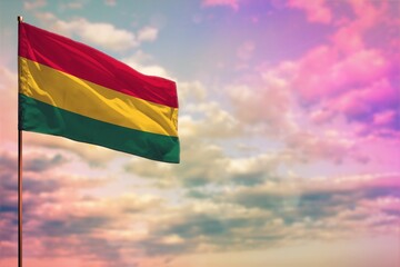 Fluttering Bolivia flag mockup with the space for your content on colorful cloudy sky background.