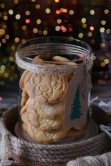 Christmas cookies tiger's head in a transparent glass jar