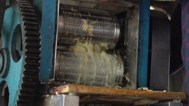 Sugarcane juice Machine Goregaon Mumbai Maharashtra India making close up