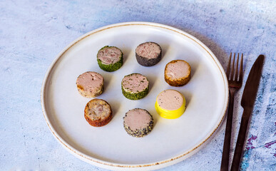 Different type chicken and liver pate in a plate