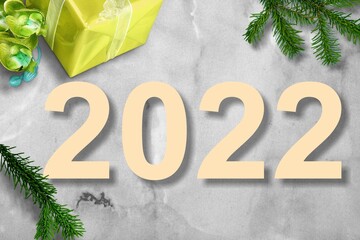 NEW year merry christmas and happy holiday numbers 2022 on a light background