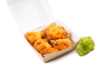 Box with tasty chicken nuggets