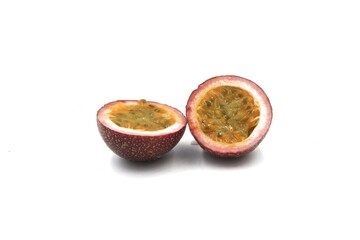 2 half of passion fruits isolated on white background