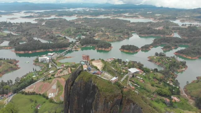 Aerial view of the Piedra del Penol rock in Guatape, Colombia during Daytime -