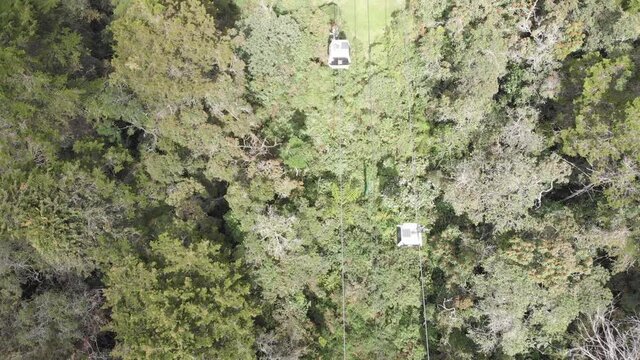 Flying over Medellin Colombia&rsquo;s Jungle City - Cable Car System in Arvi Park - aerial drone shot