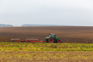 A tractor with a large double plow