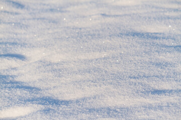 Fototapeta na wymiar Snow texture close view. Snow surface and texture.