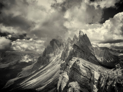 Black and white picture of dolomietes under cloudy sjy