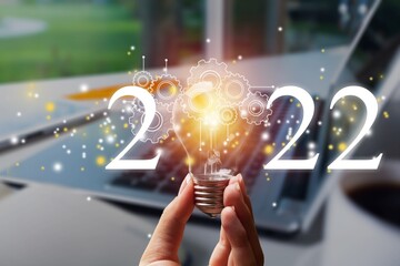 Inspirational pictures of the New Year 2022 with glass bulb