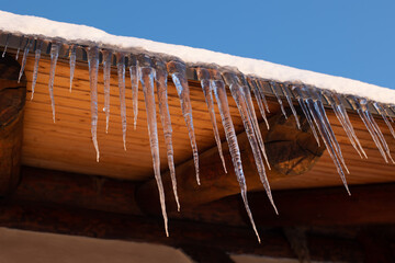 Icicles on the wooden roof.