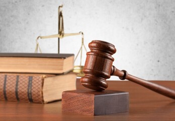 Legal Law and Justice concept, law book with a wooden judges gavel on table