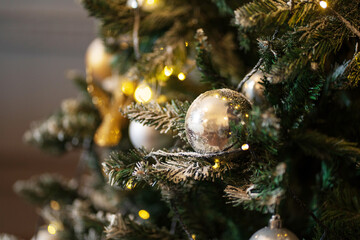 Christmas balls hang on the Christmas tree