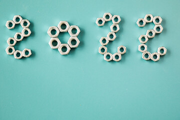 2022 New year numbers with bolts and nuts, building materials