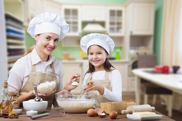 happy Mother and daughter preparing cream puffs