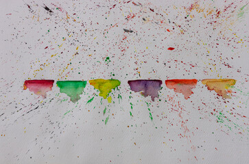 Abstract watercolor on white background. Color splashing on paper. Hand drawn. The dance of paint on paper with water .