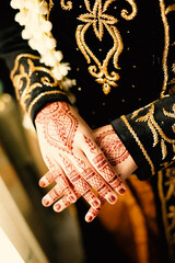 Bride henna carved beautiful and unique at bride's hand	
