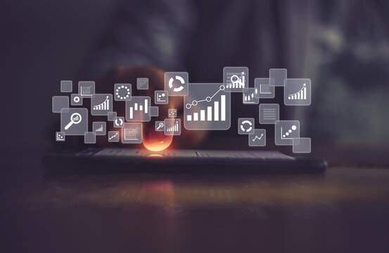 Businessman using smartphone in data management.