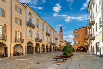 Cuneo, Piedmont, Italy - October 6, 2021: Piazzetta del Grano (14th century) with historic buildings renovated with arcades in Via Roma between the town hall and Piazza Torino