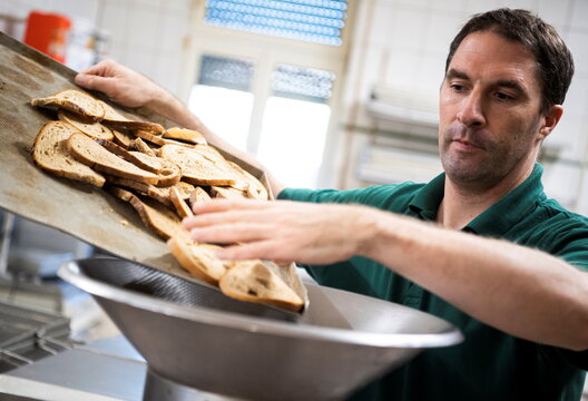 Baker uses leftover bread in a deep fryer in Moosinning
