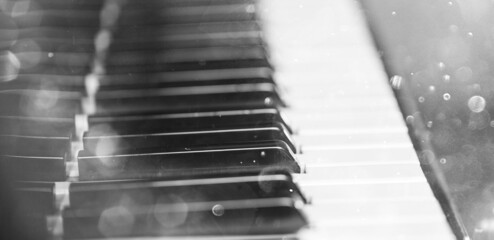 Piano keyboard background. Piano keys with lights