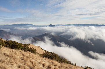 Slovakia and Slovak mountains. View from Stoh, Mala Fatra. Landscape and nature in autumn and fall. View and lookout above the coulds and inversion.