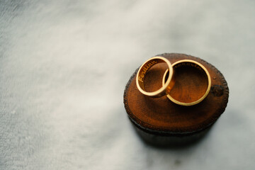 Obraz na płótnie Canvas Wedding rings symbol love family. A pair of simple wedding rings, wear a ring