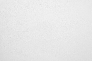 Seamless texture of white cement wall a rough surface, with space for text, for a background..