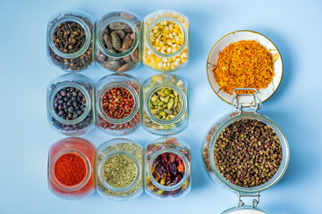 Set of spices isolated on light blue background