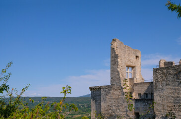 The ancient ruins of the Castle of Marquis de Sade. Lacoste, Provence, France. Historical tourism. 