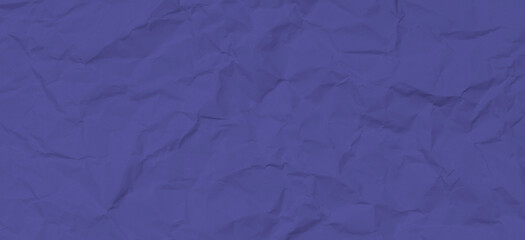 Old grunge crumpled wrinkled paper texture background tonned in color the year 2022 very peri