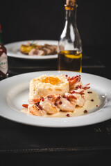 Perfect Seafood Menu Dish Plate Food Octopus Salmon, Shrimp Risotto Pasta Vegetables Salad Fish on a Dark Background