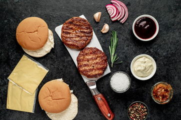 recipe for making a burger on a stone background
