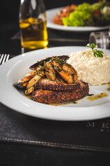 Perfect Seafood Menu Dish Plate Food Octopus Salmon, Shrimp Risotto Pasta Vegetables Salad Fish on a Dark Background