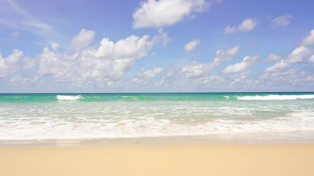 Landscape view beach sea and sand on summer.Waves smooth splashing soft waters. 