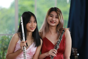 woman musician playing classical flute music instrument, workshop for performance concert