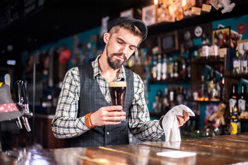 Bartender concocts a cocktail in the beerhouse