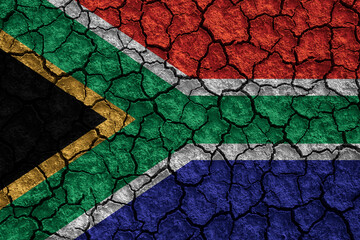 South Africa flag painted on a cracked ground 