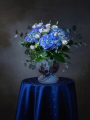 Still life with splendid bouquet in blue colors
