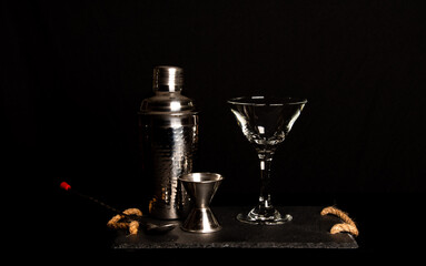 Obraz na płótnie Canvas Cocktail instruments on black background.