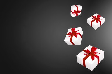 Set of gift boxes tied with ribbons on a desk